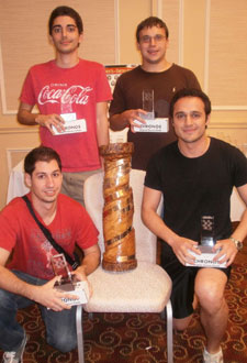 Young chess players celebrating with a trophy