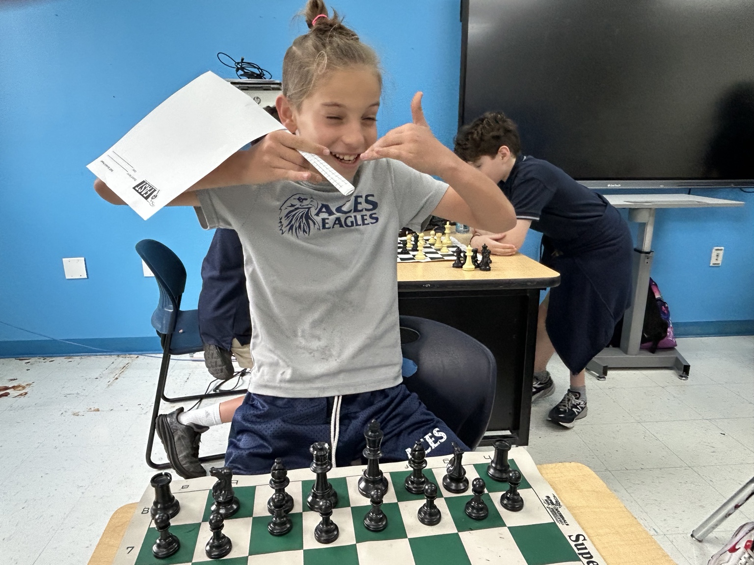 Young students concentrating during chess class