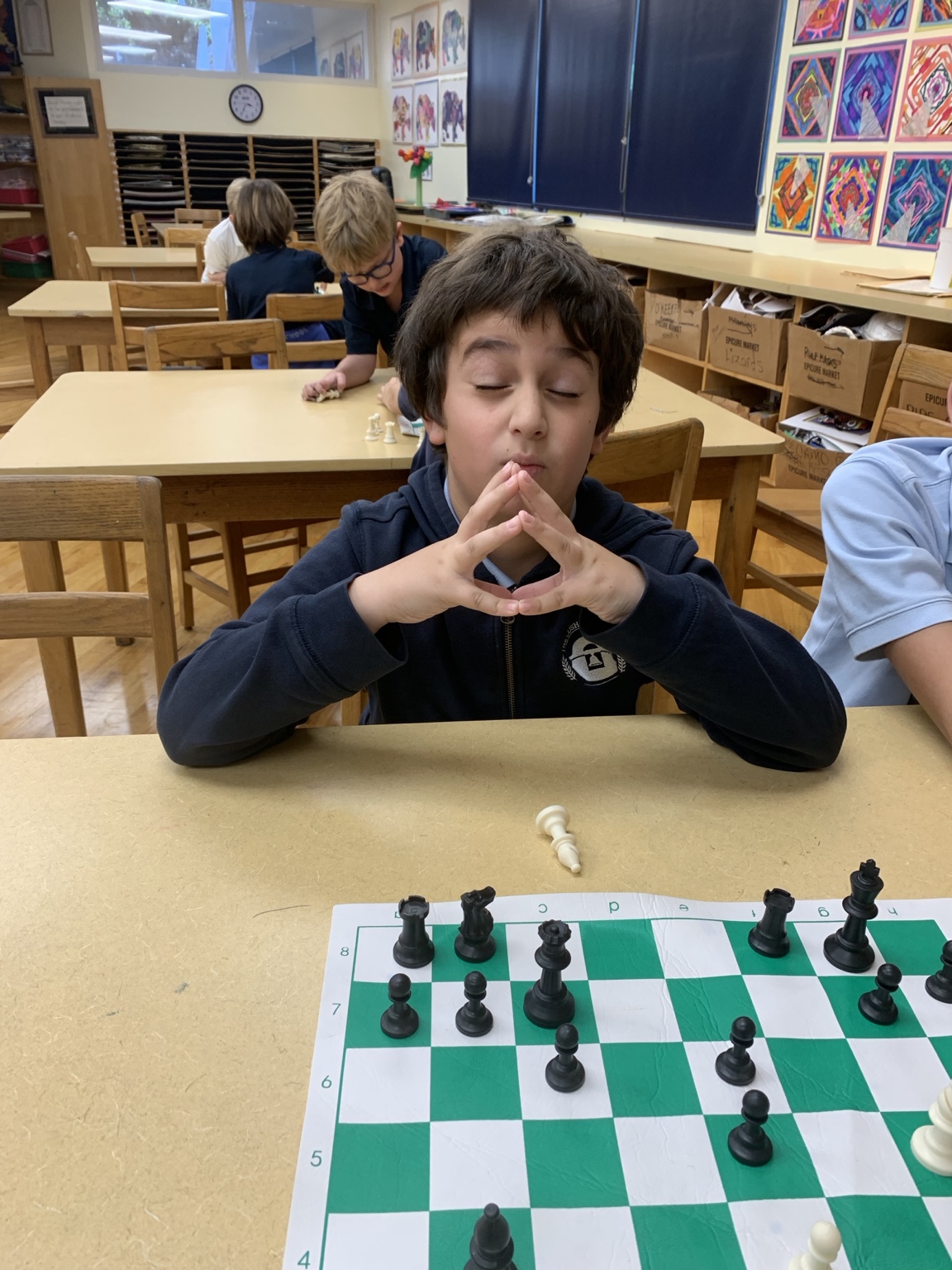 Student concentrating during a chess game